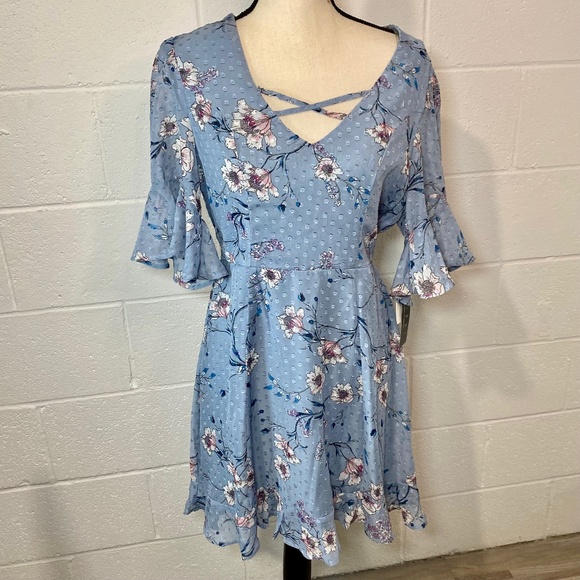Trixxi Clothing Company Blue Floral Flutter Sleeve Criss Cross Chest Dress - Picture 1 of 15